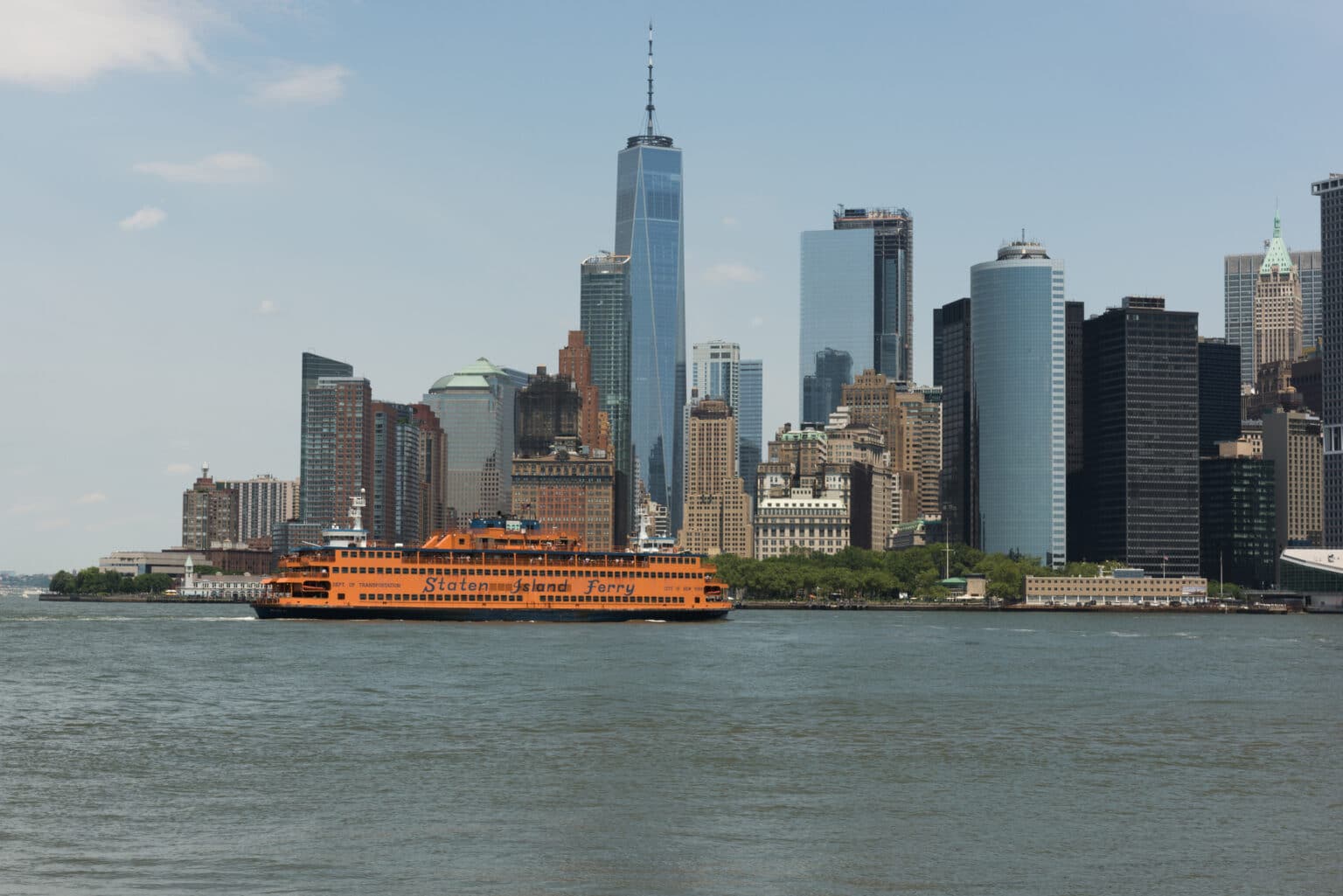 New York: The Staten Island Ferry leaving lower Manhattan late in the day.