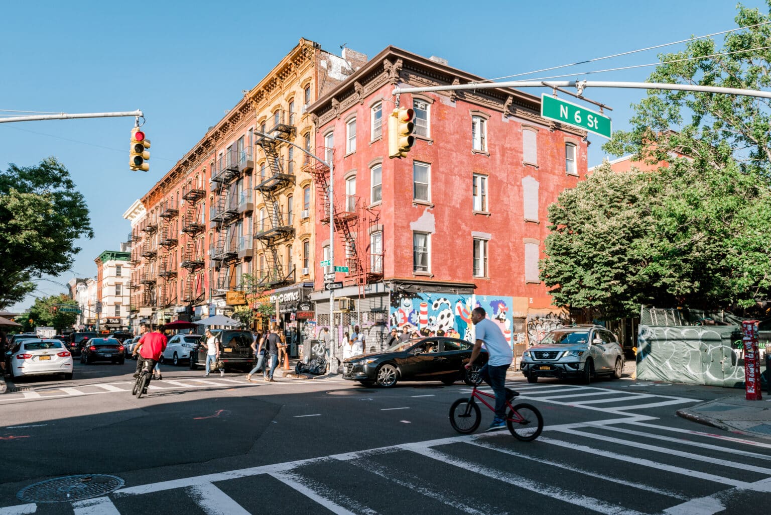 Williamsburg, Brooklyn, United States - June 23, 2019: People are walking along Bedford Avenue in Williamsburg, Brooklyn on a beautiful weekend afternoon.