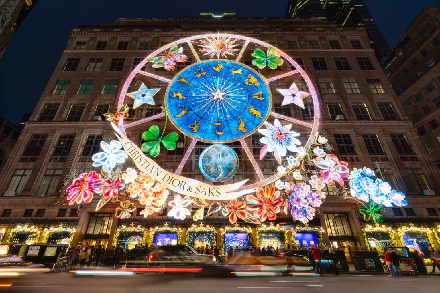New York City, NY, USA - November 27, 2023: Saks Fifth Avenue (department store) with Christmas light show and holiday season window displays. 5th Avenue, Midtown Manhattan